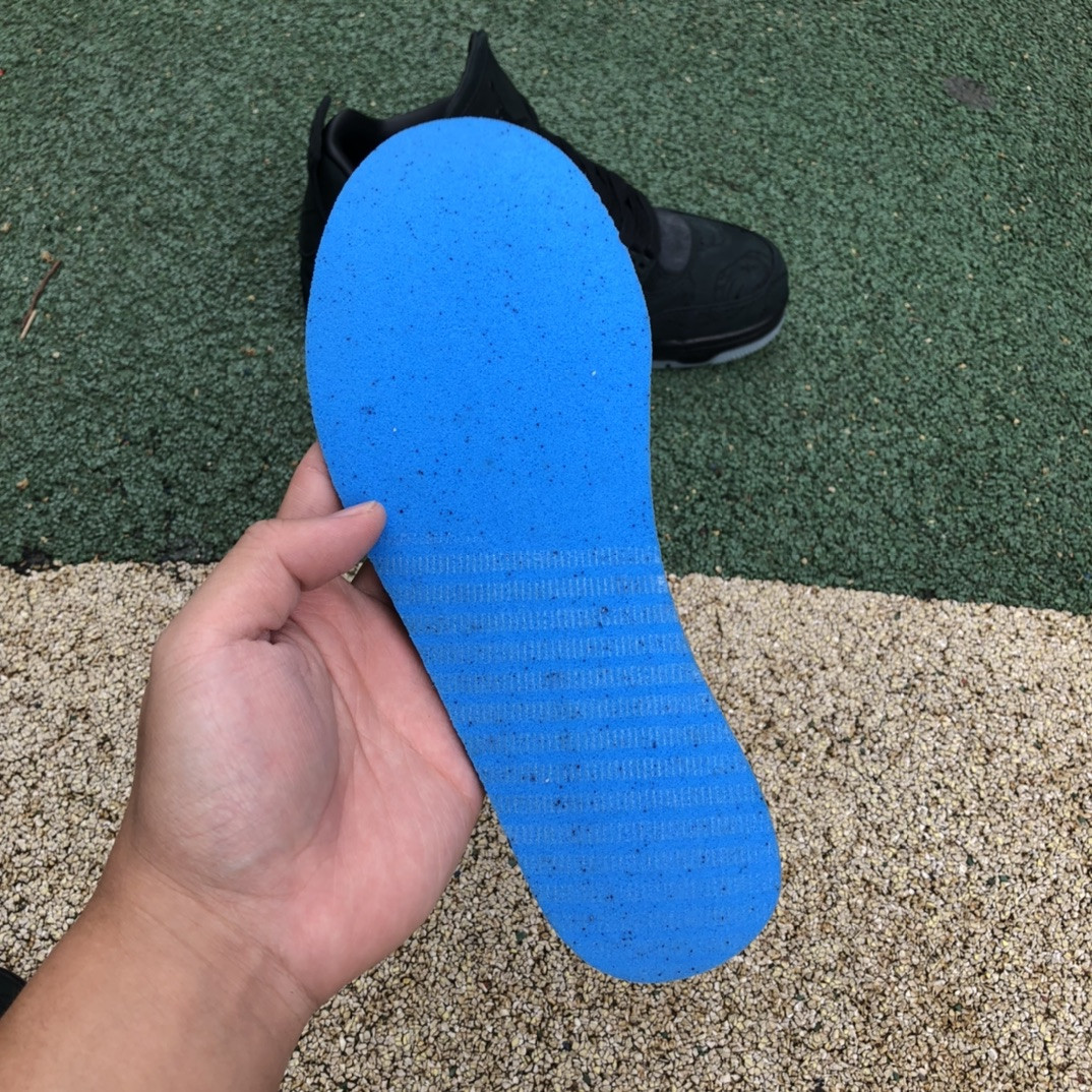 UA Jordan 4 Retro Kaws Black