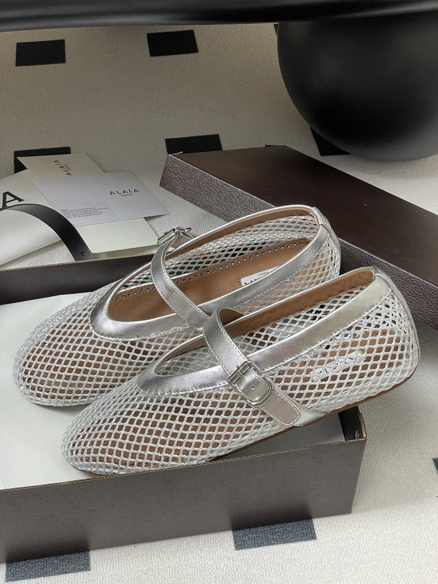 UA ALAÏA BALLET FLATS IN FISHNET