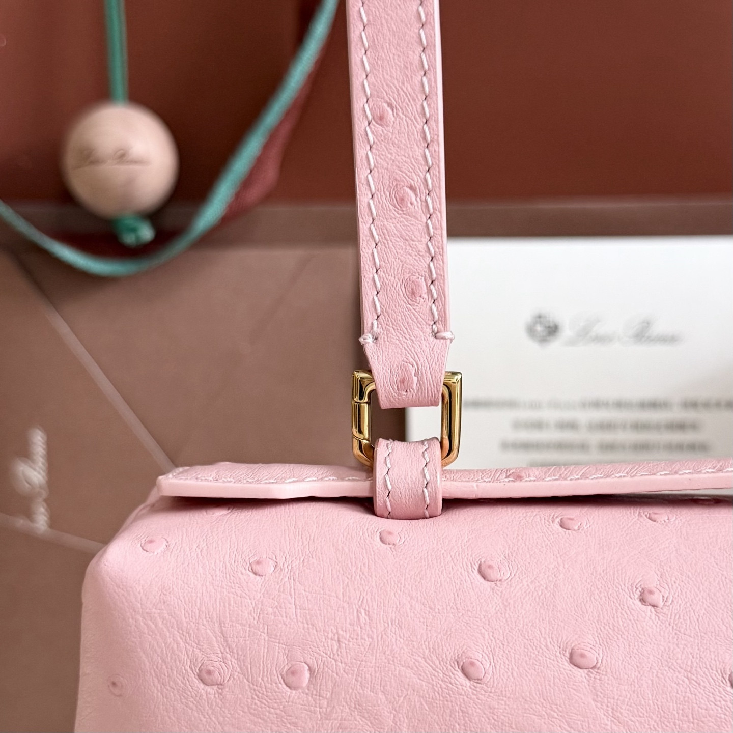 L**o p*ana extra pocket l27 ostrich-grained leather 16x27x10cm